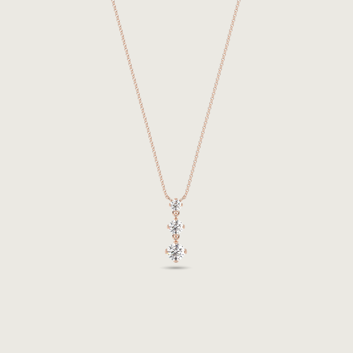 three stone diamond necklace - rose gold