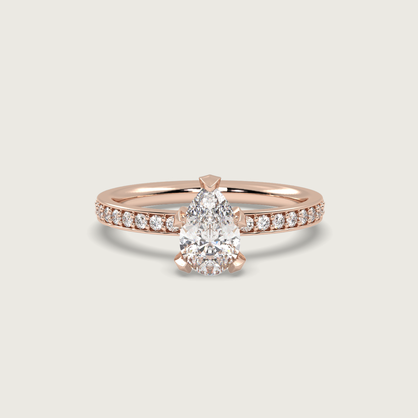 Pear Shape Diamond Solitaire Ring with Pavé Set Band in Fleur de Luce Setting