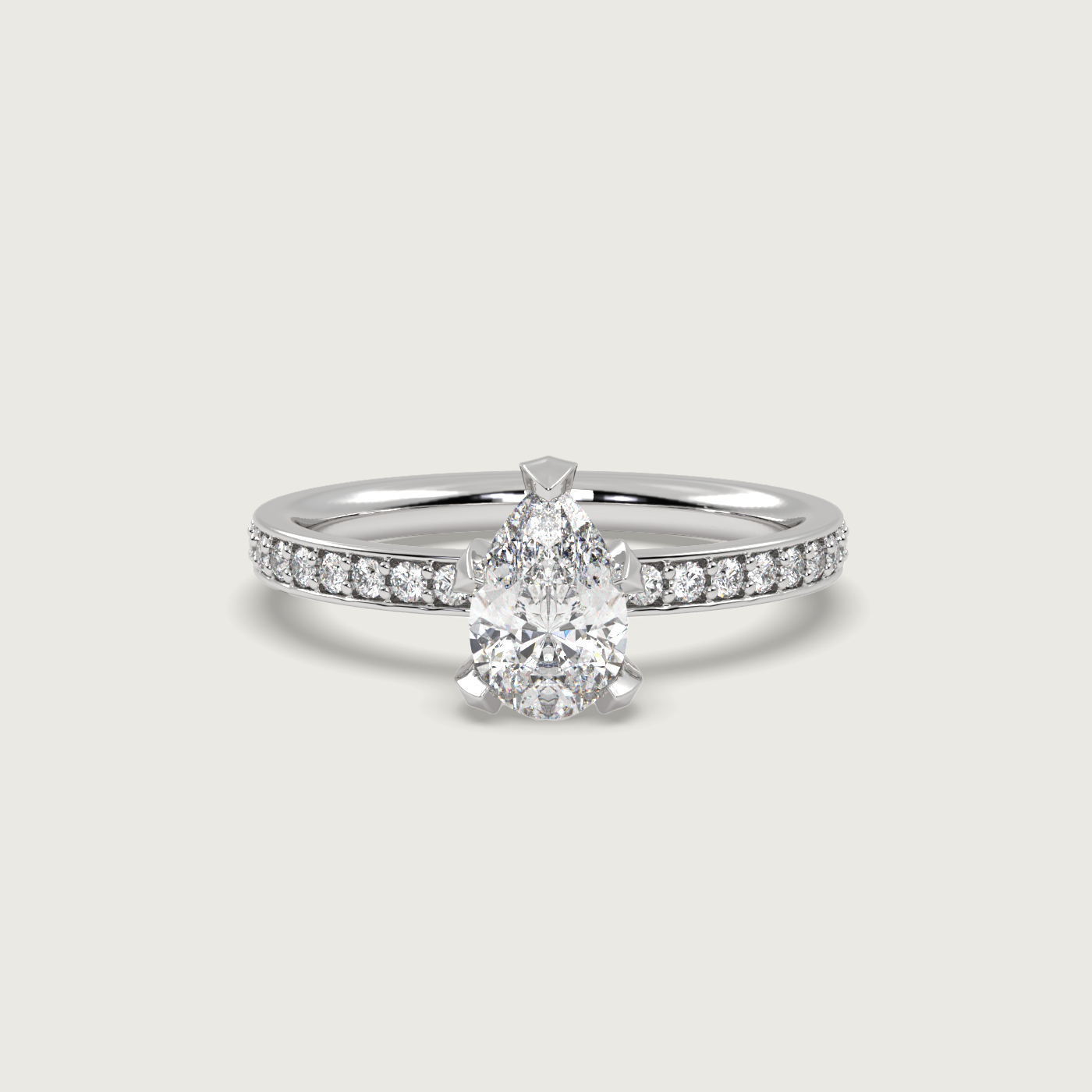 Pear Shape Diamond Solitaire Ring with Pavé Set Band in Fleur de Luce Setting