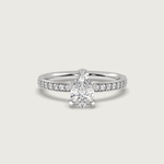 Pear Shape Diamond Solitaire Ring with Pavé Set Band in Fleur de Luce Setting