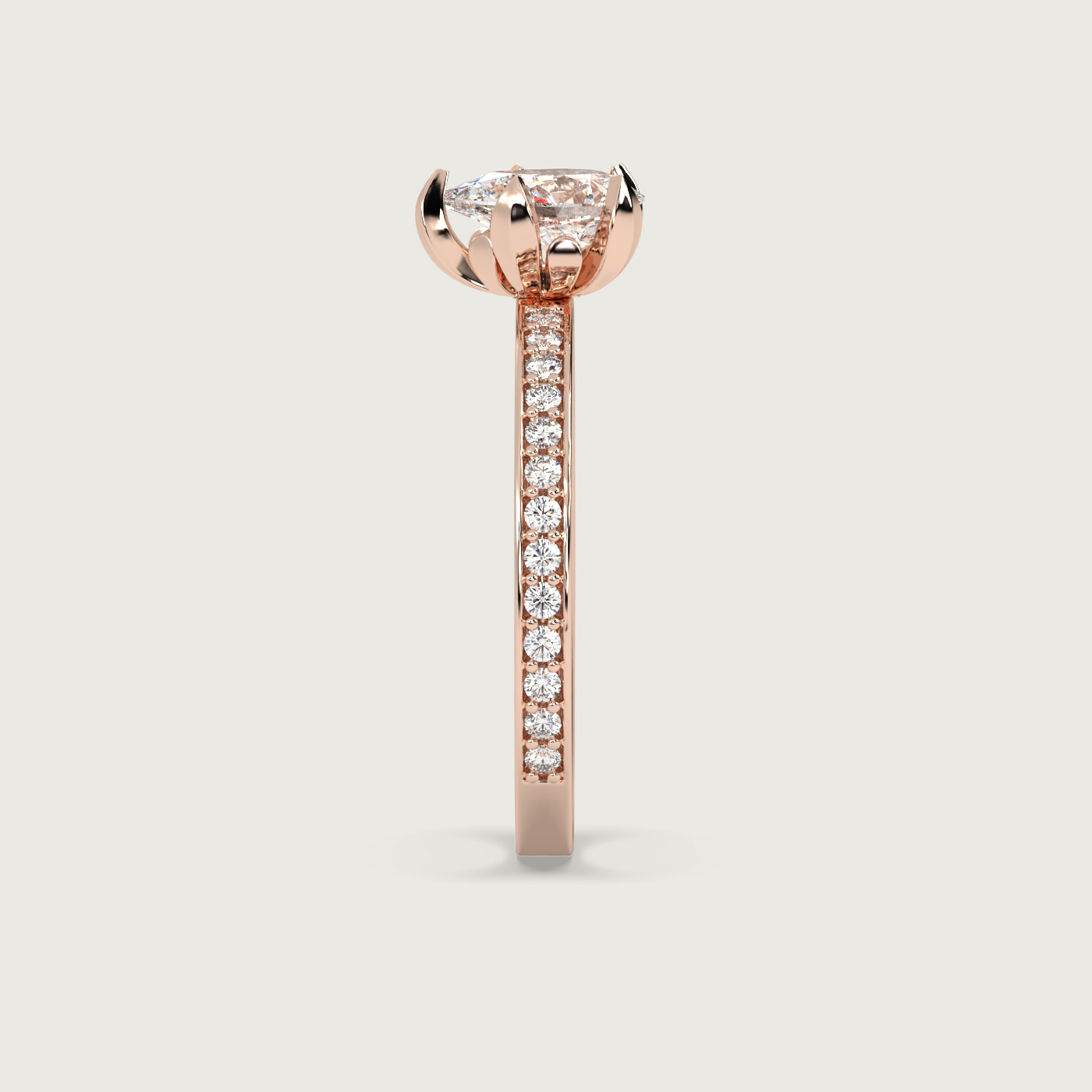Pear Shape Diamond Solitaire Ring with Pavé Set Band in Fleur de Luce Setting