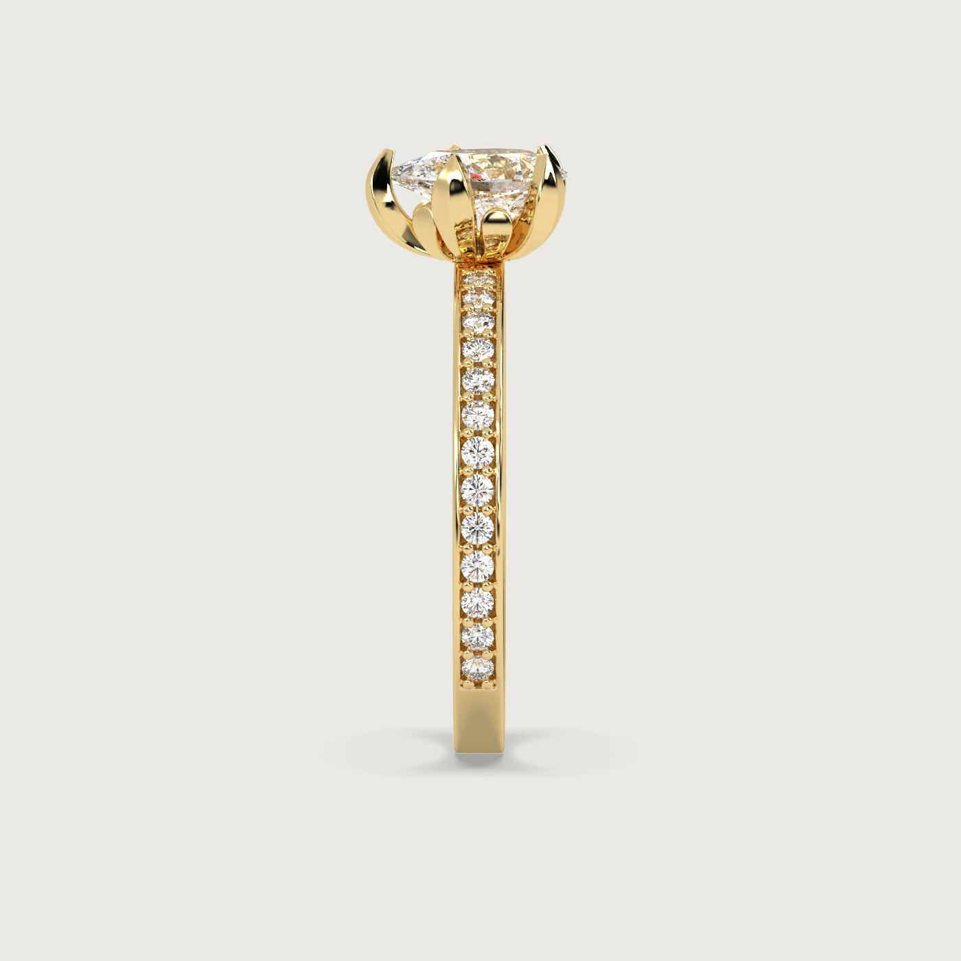 Pear Shape Diamond Solitaire Ring with Pavé Set Band in Fleur de Luce Setting