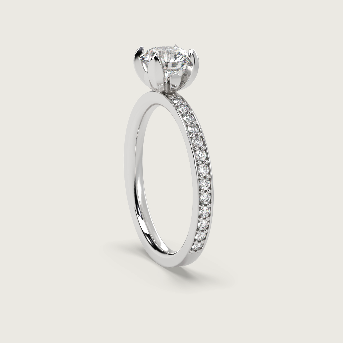 Round Diamond Solitaire Ring with Pavé Set Band in Fleur de Luce Setting