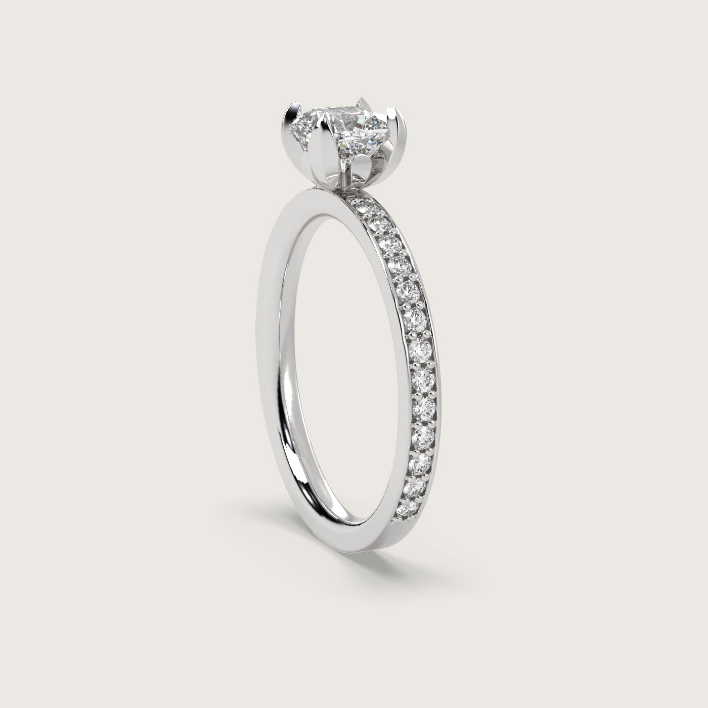 Cushion Diamond Solitaire Ring with Pavé Set Band in Fleur de Luce Setting