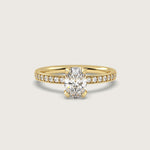 Oval Diamond Solitaire Ring with Pavé Set Band in Fleur de Luce Setting