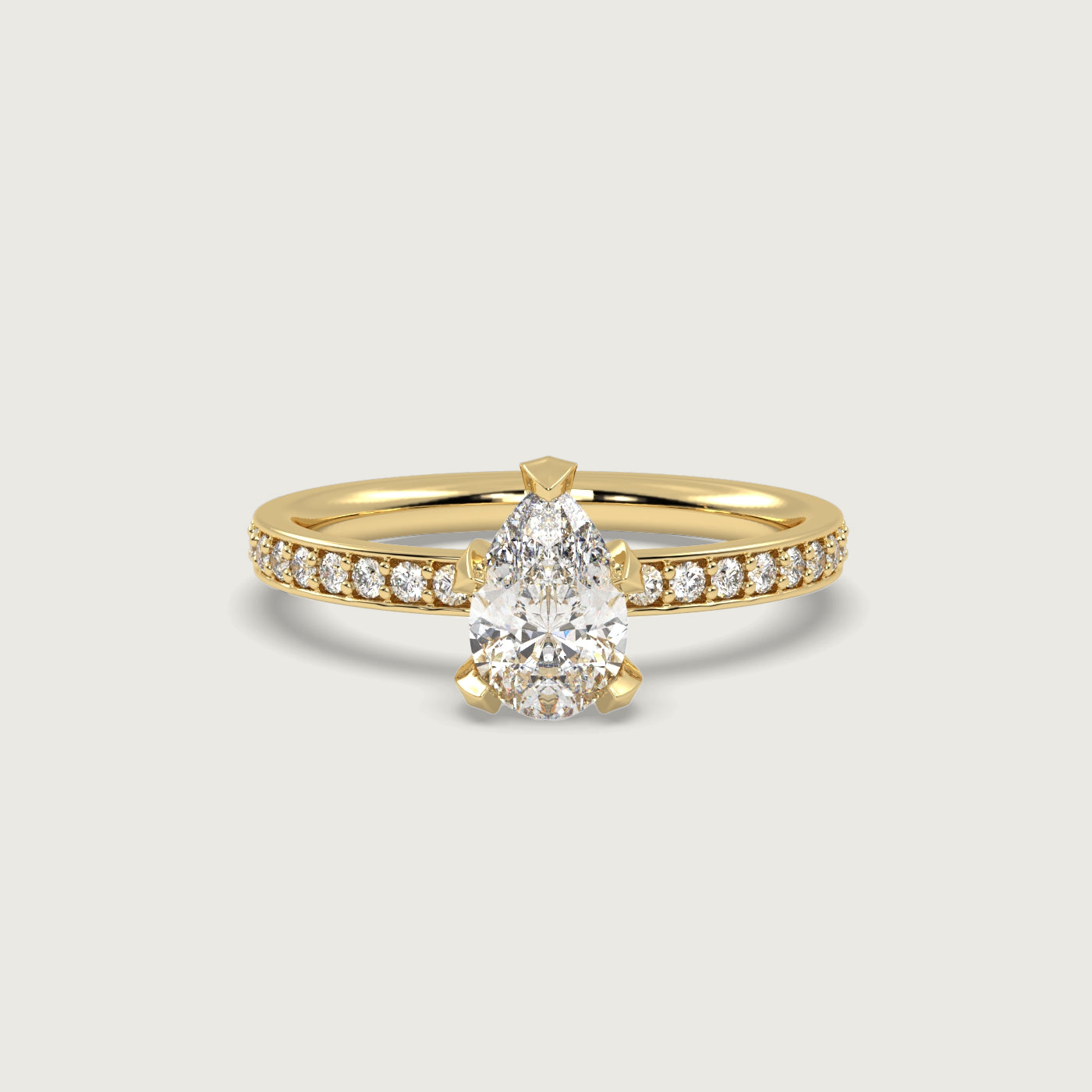 Pear Shape Diamond Solitaire Ring with Pavé Set Band in Fleur de Luce Setting