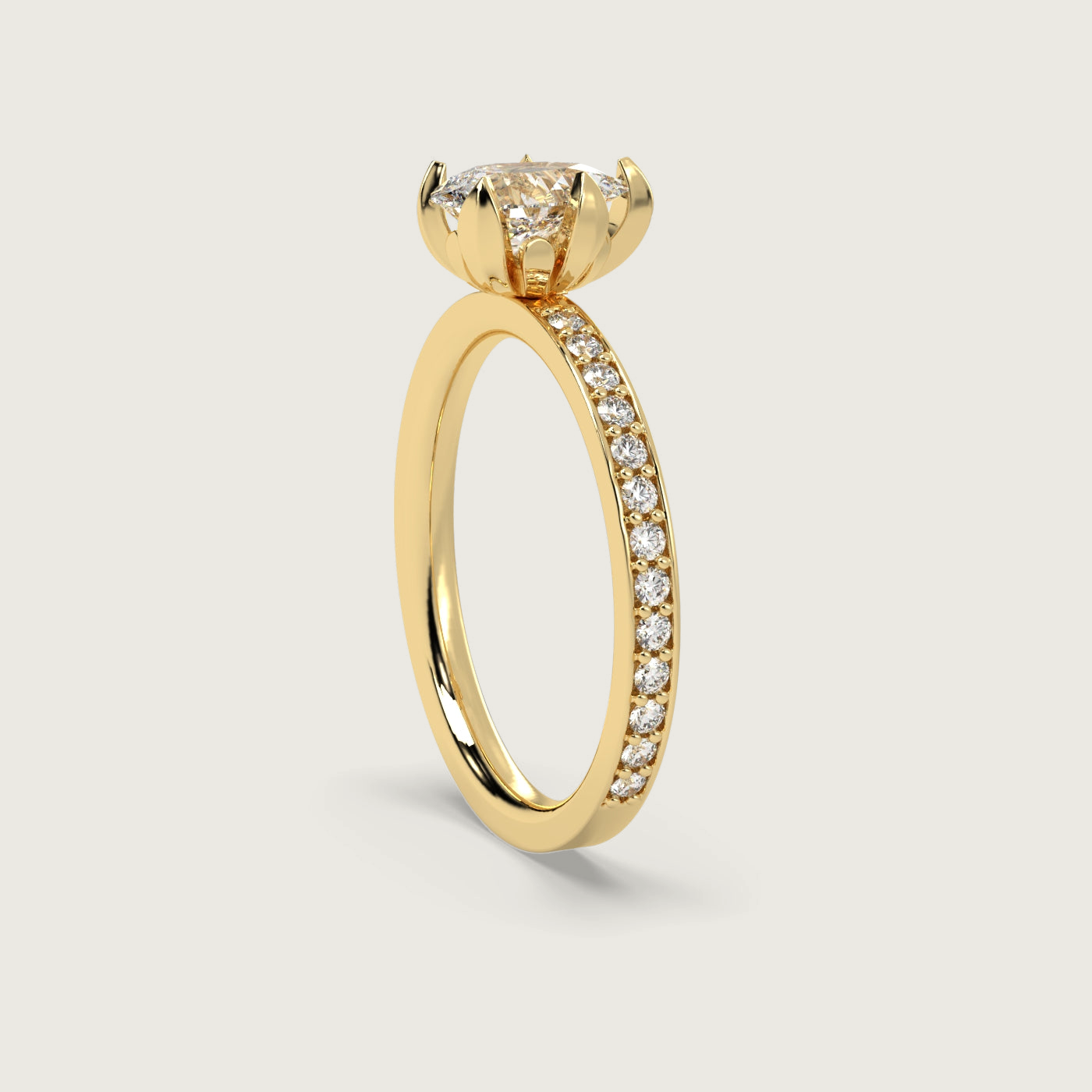 Pear Shape Diamond Solitaire Ring with Pavé Set Band in Fleur de Luce Setting