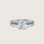 Diamond and Cornflower Blue Sapphire Pavé Engagement Ring in Fleur de Luce Setting