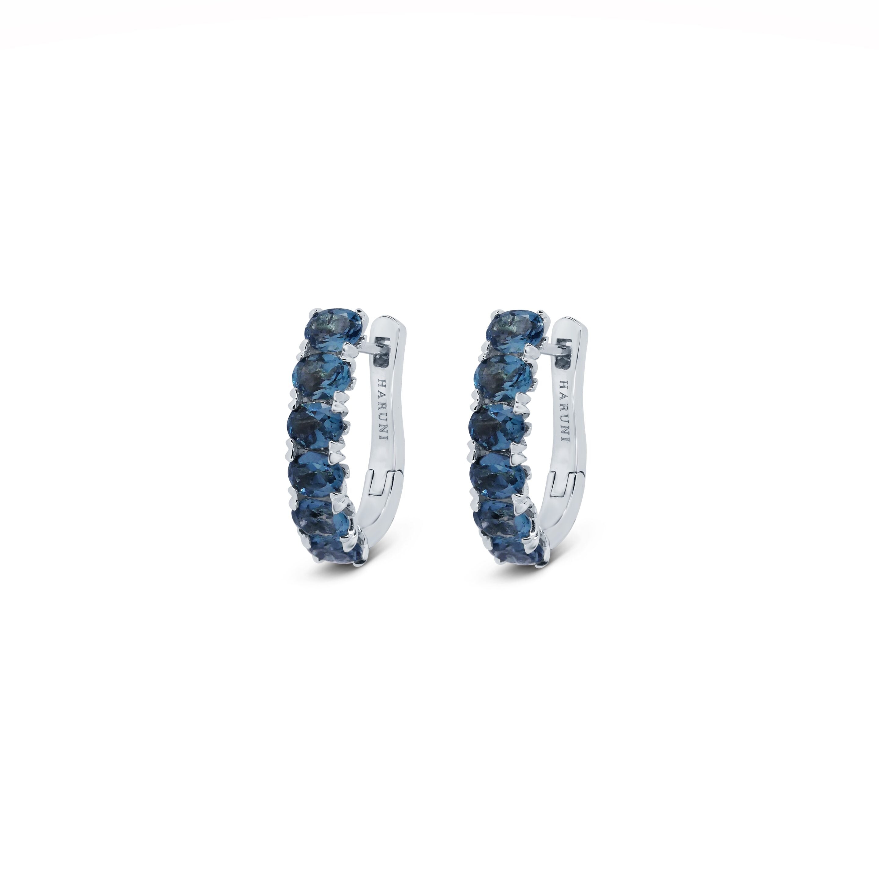 Gold Hoop Earrings: Blue Topaz Huggie Hoops in 18k White Gold