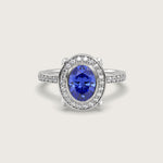 Oval Sapphire Halo Engagement Ring with Pavé Set Band in Fleur de Luce Setting
