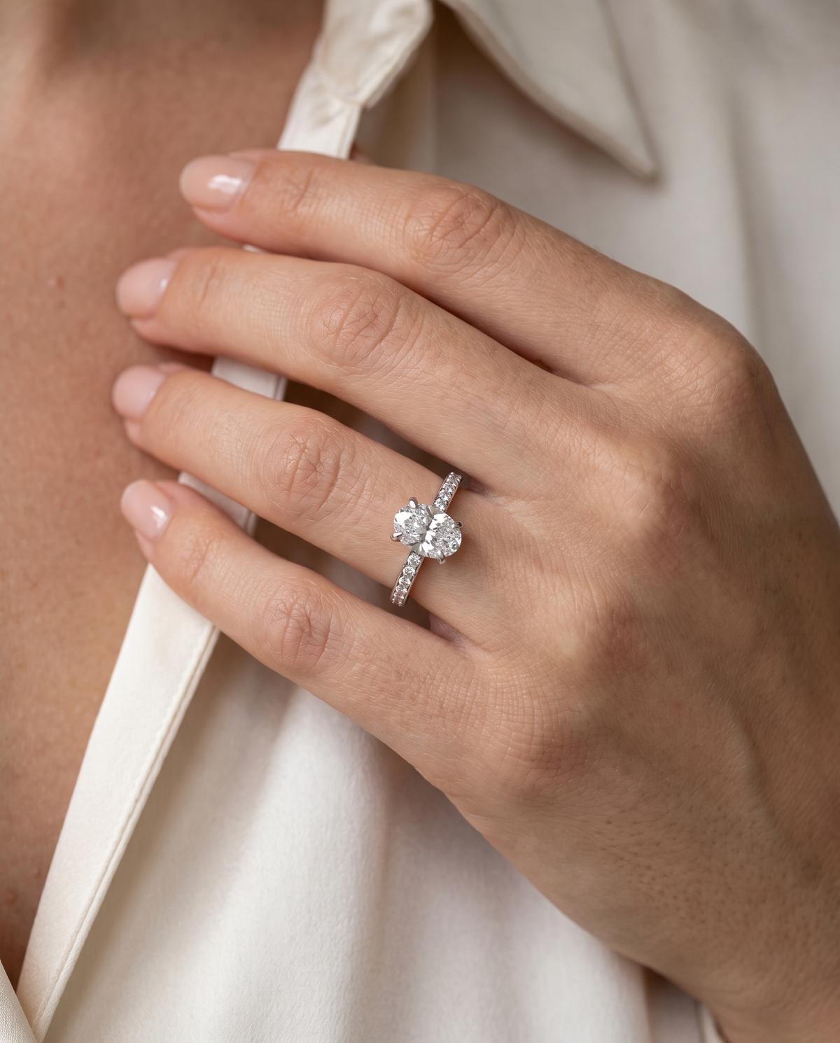 Oval Diamond Solitaire Ring with Pavé Set Band