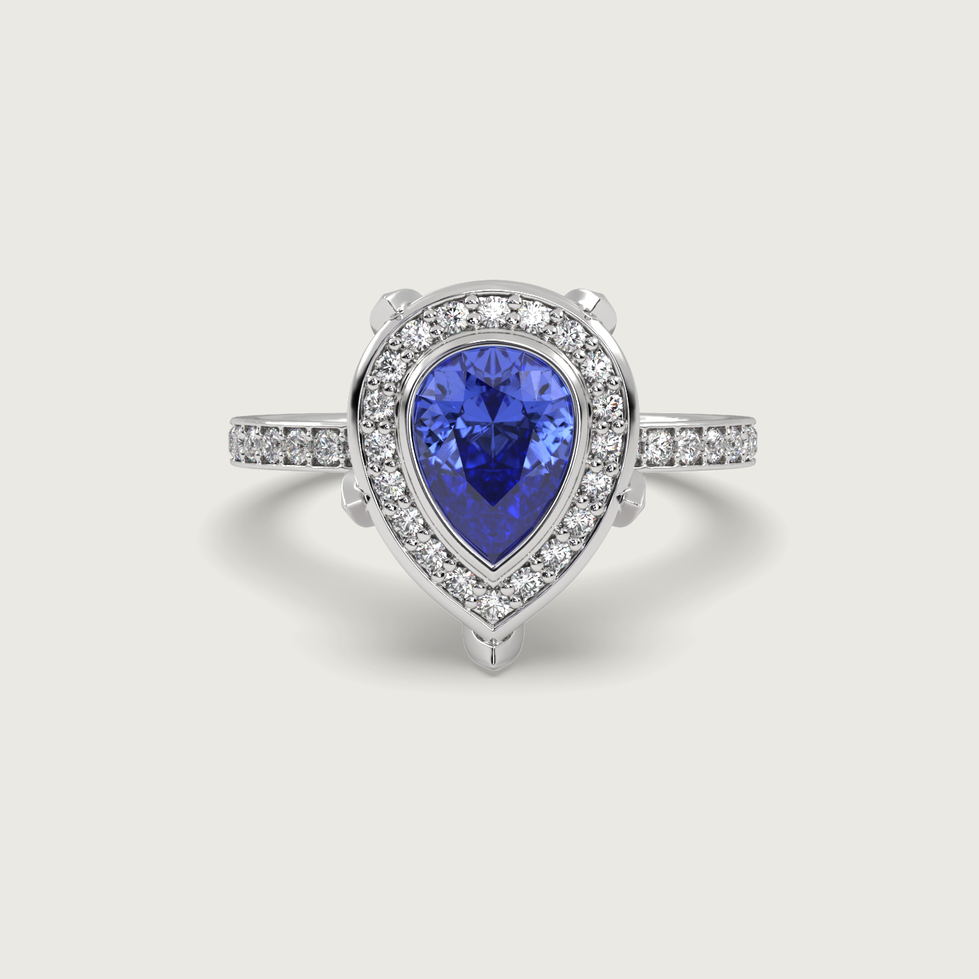 Pear Shape Sapphire Halo Engagement Ring with Pavé Set Band in Fleur de Luce Setting