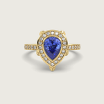 Pear Shape Sapphire Halo Engagement Ring with Pavé Set Band in Fleur de Luce Setting