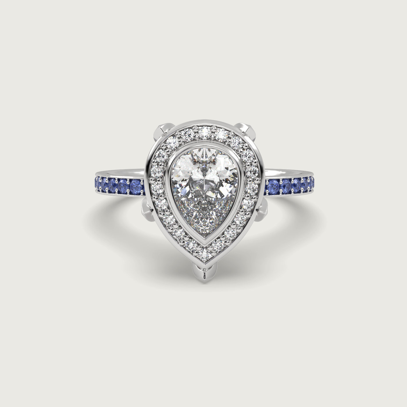 Pear Shape Diamond Halo Engagement Ring with Cornflower Blue Sapphire Set Band in Fleur de Luce Setting