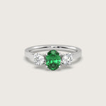 Oval Emerald and Diamond Engagement Ring in Fleur de Luce Setting