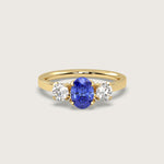 Oval Sapphire and Diamond Engagement Ring in Fleur de Luce Setting