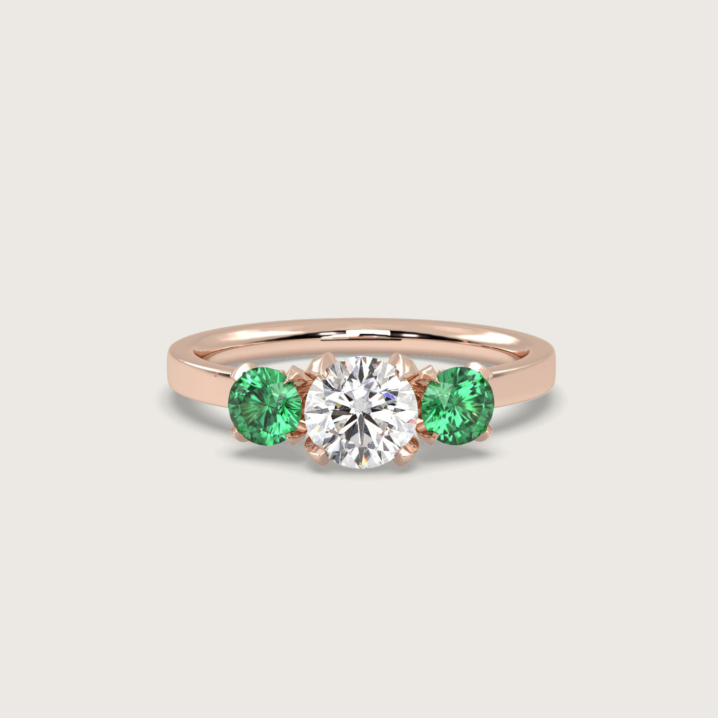 Diamond and Emerald Trilogy Engagement Ring in Fleur de Luce Setting