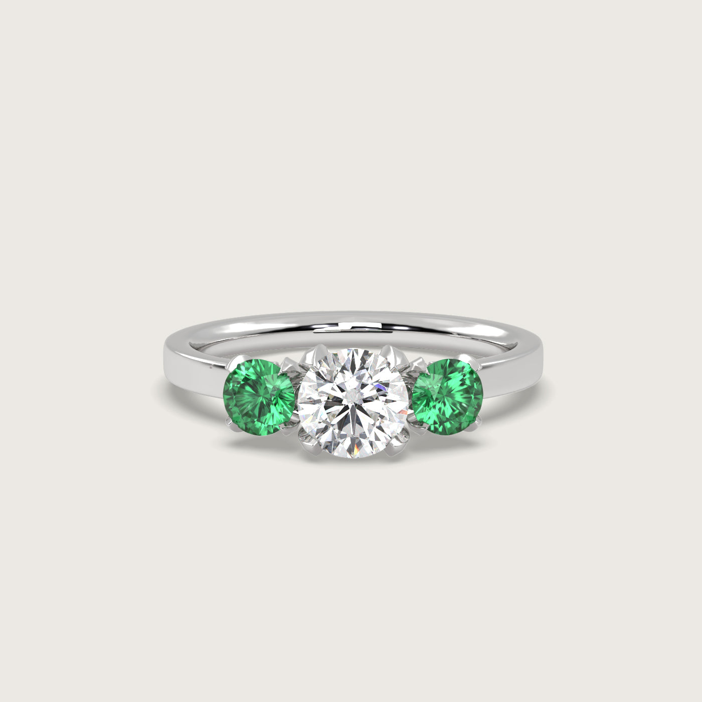 Diamond and Emerald Trilogy Engagement Ring in Fleur de Luce Setting