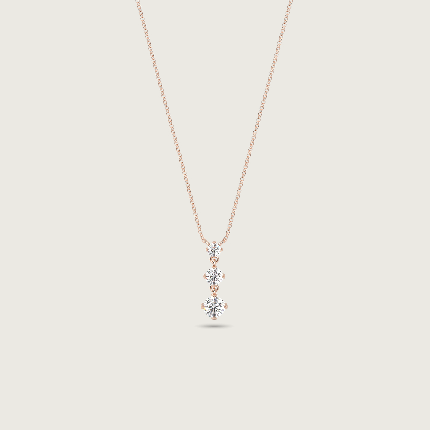 Three Stone Diamond Pendant in Fleur de Luce Setting