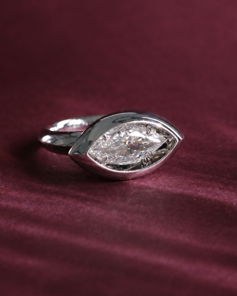 Crimson Flame Ruby Three Stone Ring in Platinum