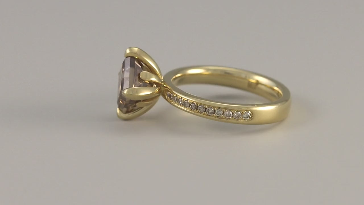 Load video: Fleur de Luce Princess Cut Brown Diamond Solitaire Ring with Pavé Band in 18k Yellow Gold